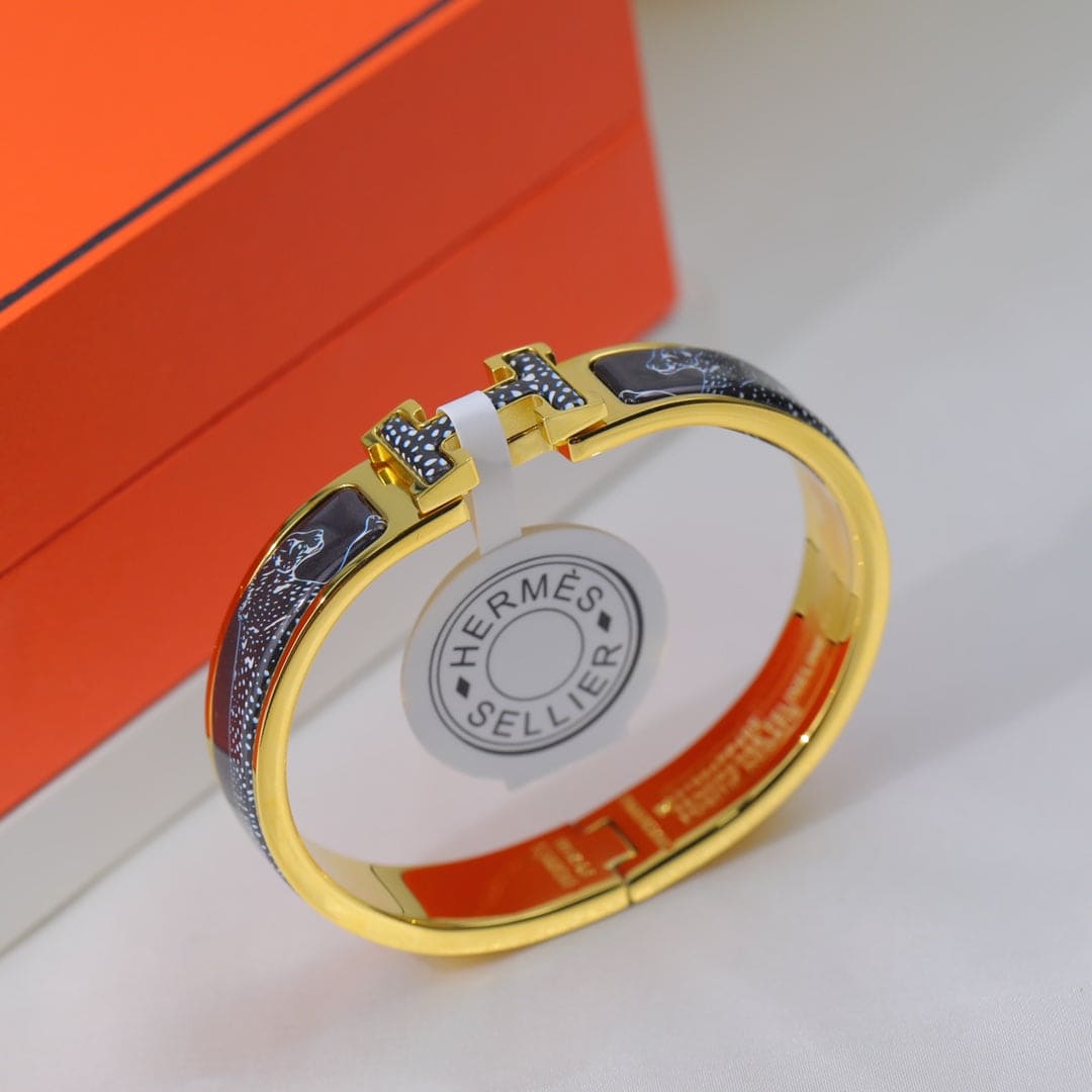 Hermes Guepards Clic Clac 18K Gold Bracelet
