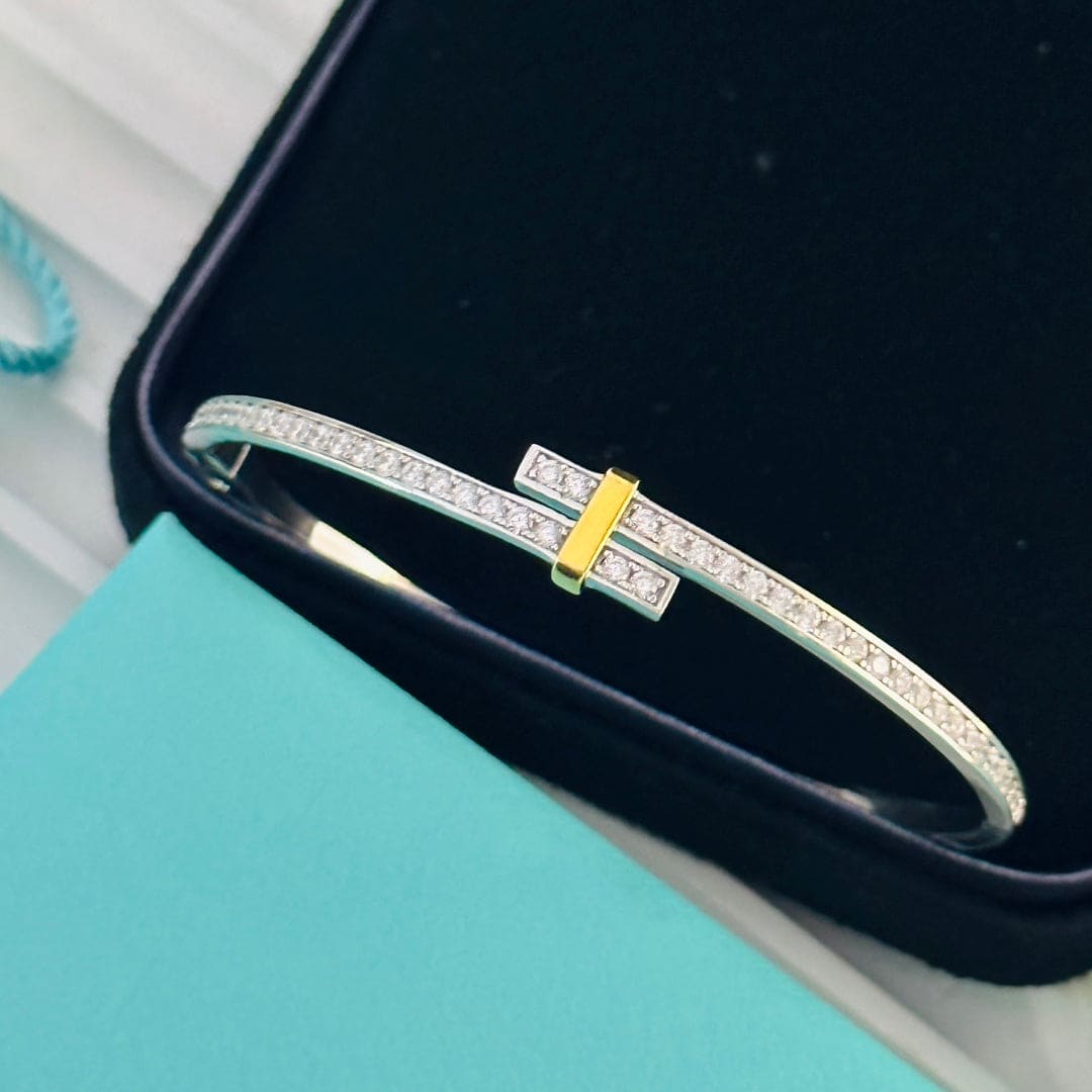 Tiffany Edge Hinged Bypass Bangle 18K Gold Bracelet