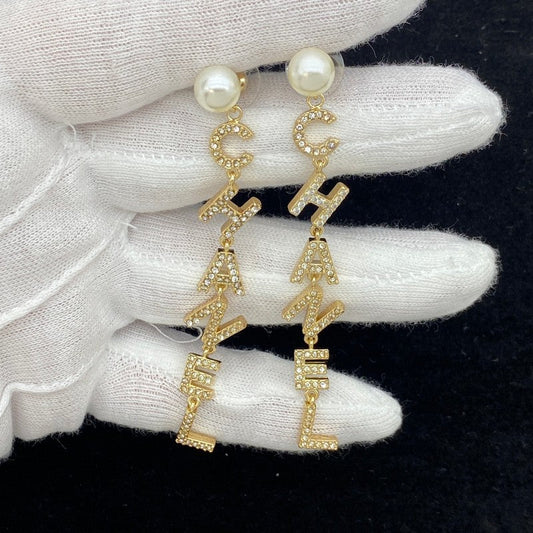 Chanel Script Long Tassel 18K Gold Earrings