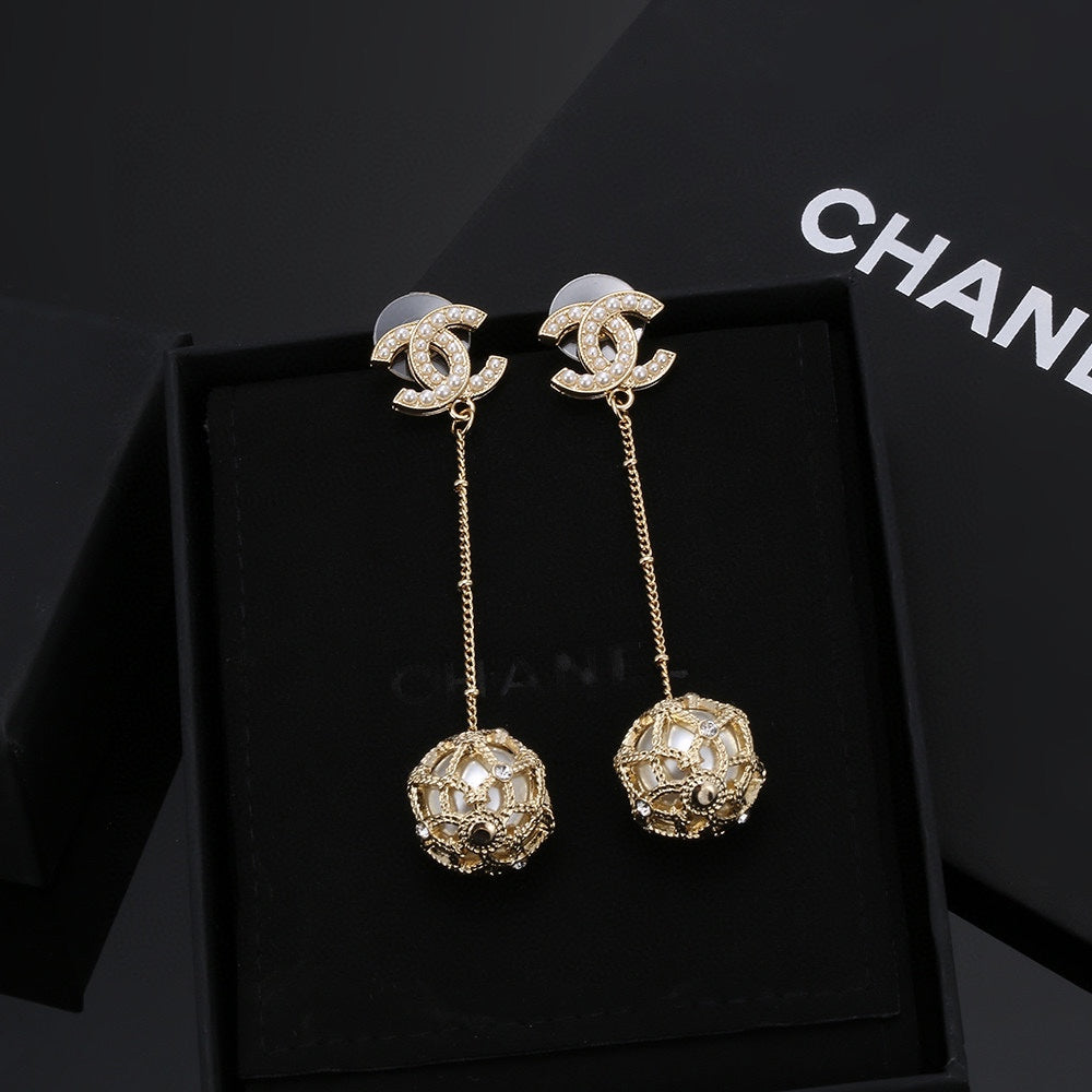 Chanel Pearl Long 18K Gold Earrings