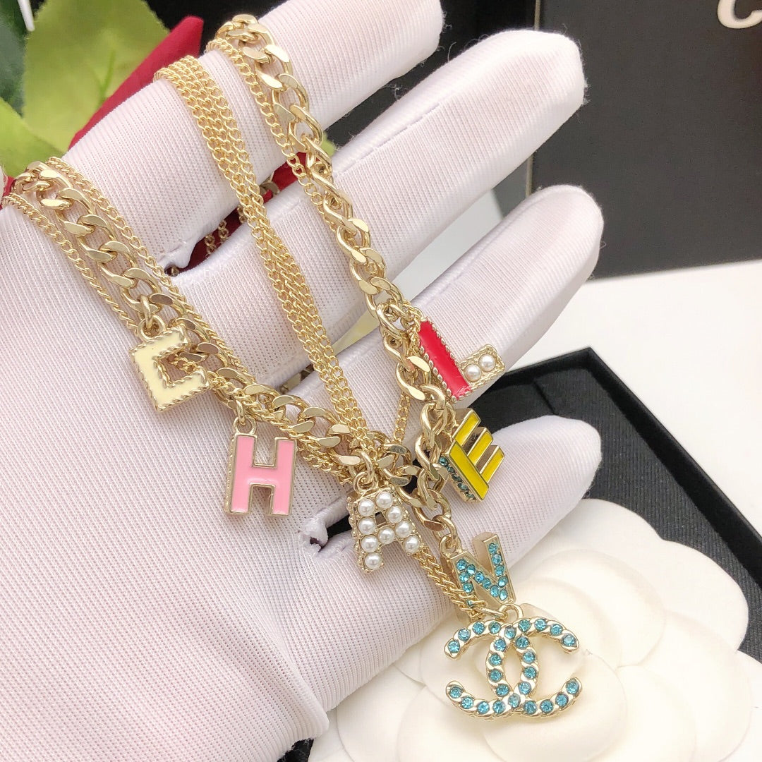 Chanel Color Typo 18K Gold Necklace