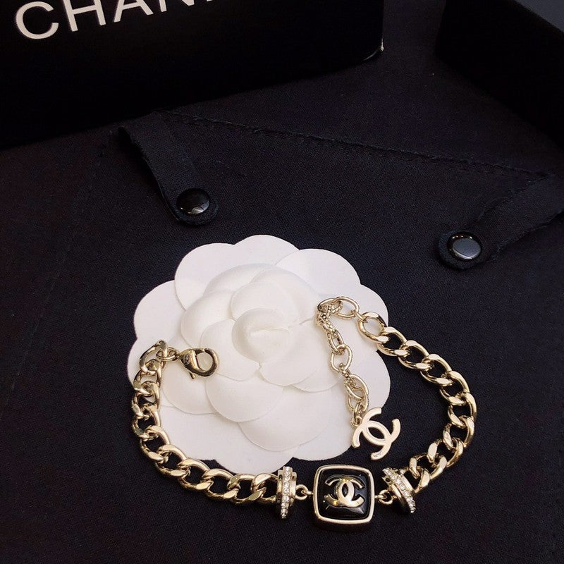 Chanel Black Logo Gold Chain 18K Gold Bracelet
