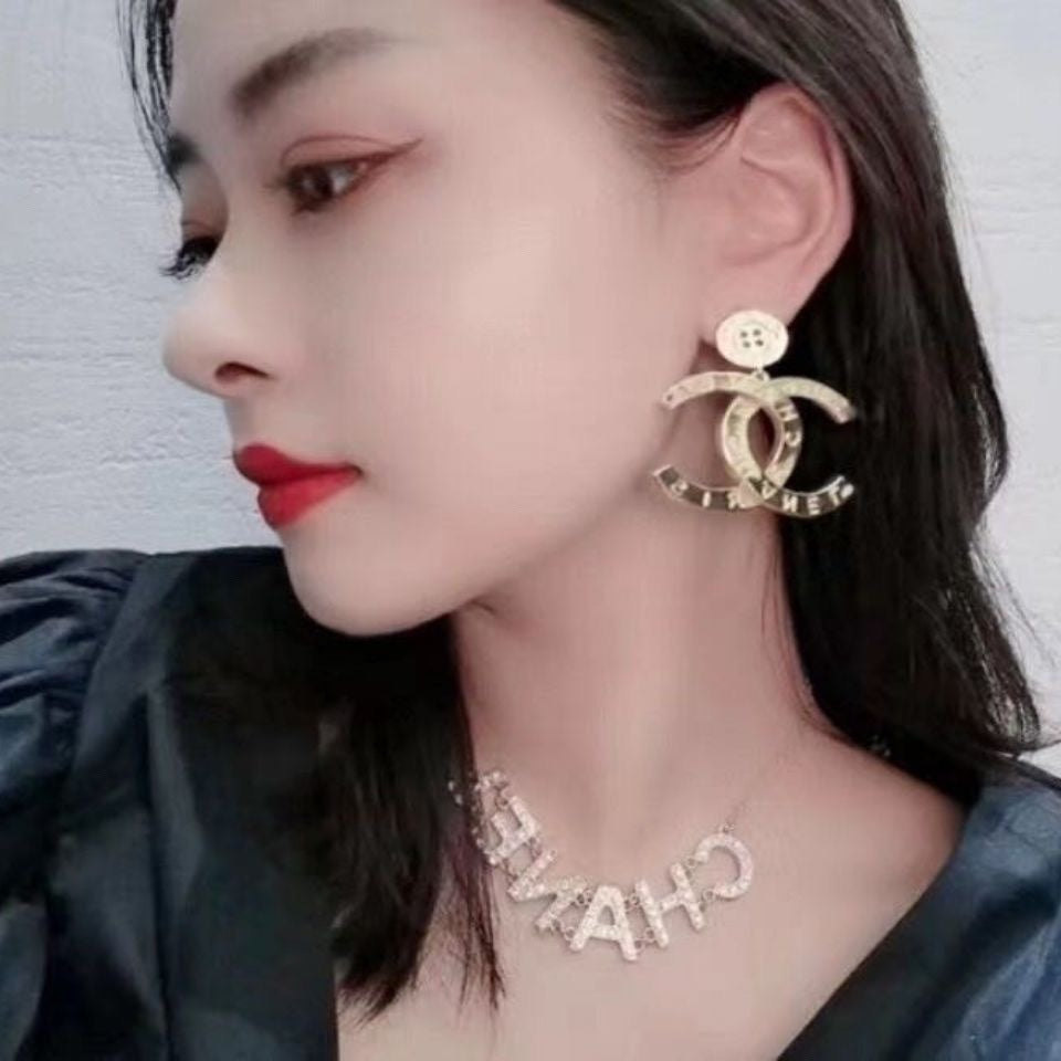 Chanel Drop Pendant 18K Gold Earrings